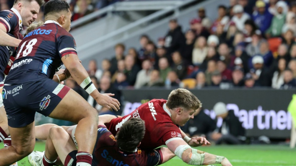 Freeman at the double as Lions sweep past Queensland Reds 52-12