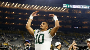 Love, Kraft star as Packers cruise past Commanders 27-18