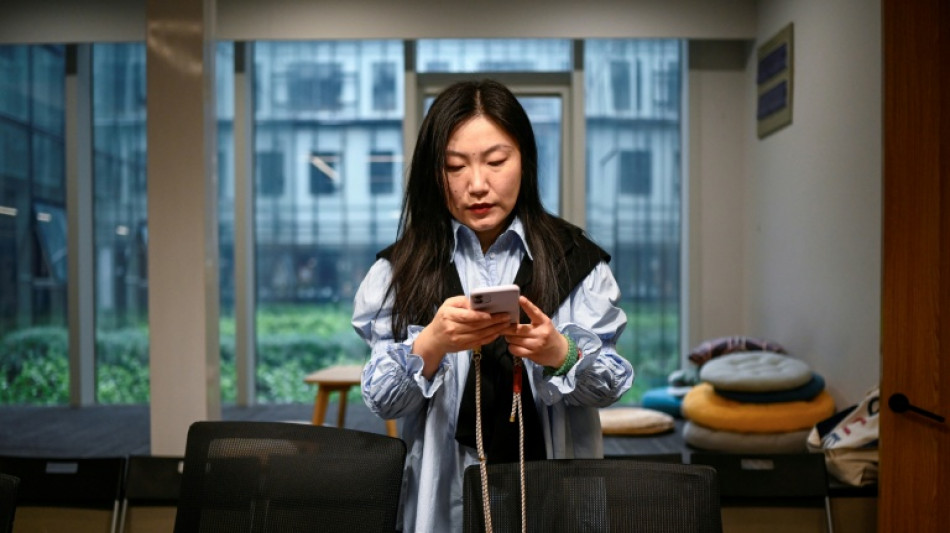 Young Chinese use AI to launch one-person firms over job anxiety