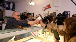 Australian PM basks in win, vows 'orderly' government