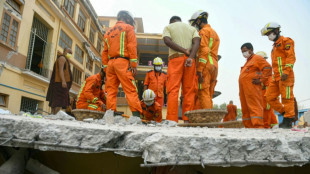 Tears, prayers in search for monks trapped by Myanmar quake