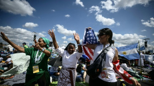 Elation as pope arrives by helicopter to open-air youth vigil in Rome