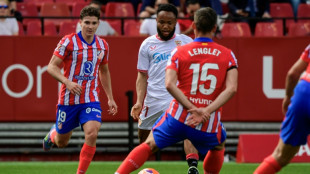 Atl&eacute;tico de Madrid vence Sevilla nos acr&eacute;scimos (2-1) e segue vivo no Espanhol