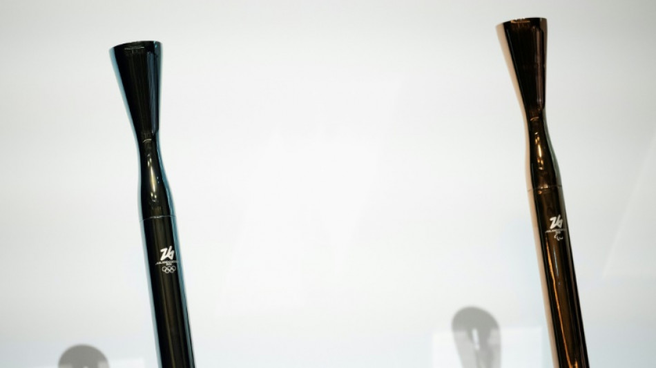 Winter Olympics torch unveiled in joint ceremony in Milan and Osaka