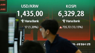 Asian stocks mostly down with tech firms back under pressure