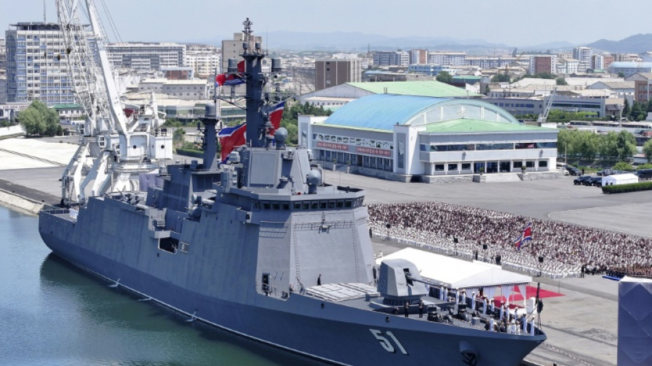 North Korea's Kim unveils plans for 10,000-tonne warships, nuclear navy 