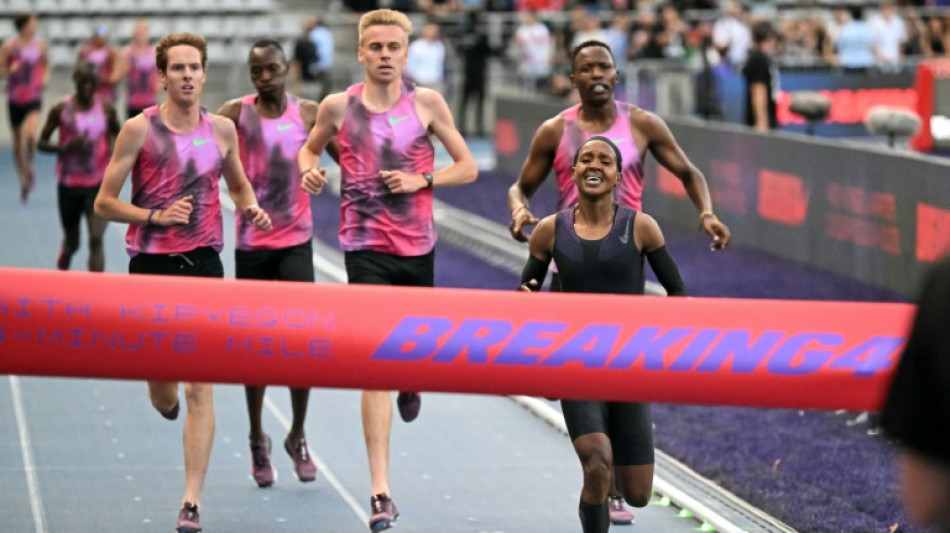 Kipyegon says a woman will run a sub-four minute mile