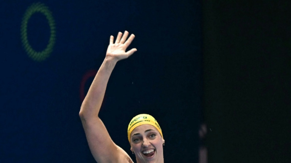 Australia's beaming Harris foils Walsh treble bid at swimming worlds