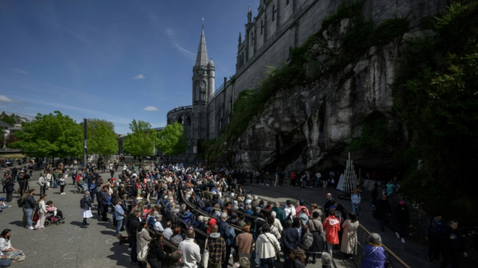 In Lourdes, Catholic pilgrims mourn the 'pope of the poor'