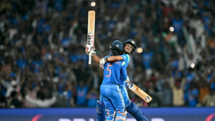 Record-breaking India upset Australia to reach World Cup final