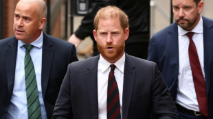 Prince Harry pays respects at grandmother's grave