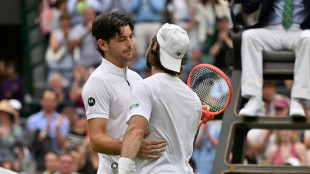 Fritz into Wimbledon quarter-finals after Thompson retires