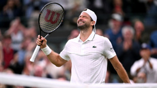 Emotional Dimitrov enjoys redemptive Wimbledon win over Mensik