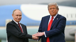 Trump offers warm welcome to Putin at high-stakes summit