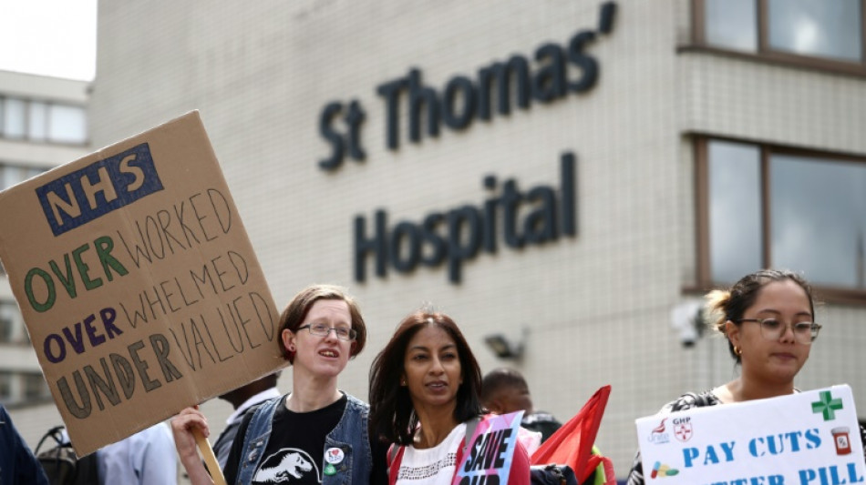 Senior doctors in England stage rare walk out