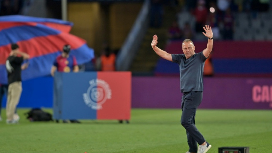 Flick extends Barcelona deal to 2027 after title triumph