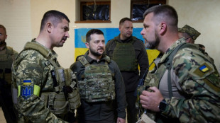 Zelensky visits Ukraine's east, fires Kharkiv security chief